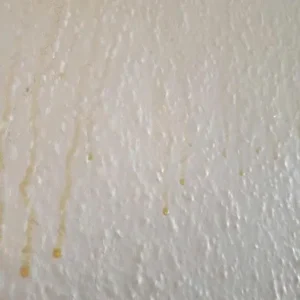 Yellow Residue Dripping Down Your Bathroom Walls?