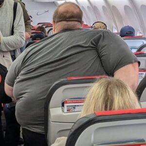 After Viral Photo of Man Struggling in Seat