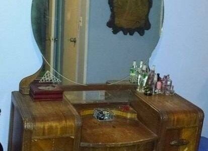 Instead of throwing a 1942 vanity table away
