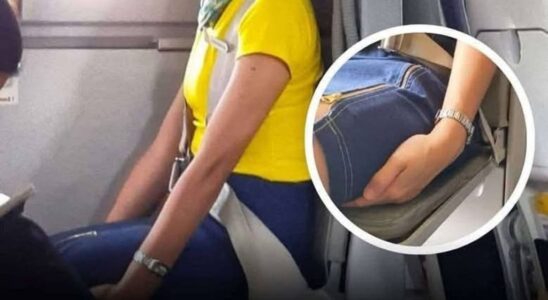 Here’s Why Flight Attendants Sit On Their Hands During Takeoff and Landing