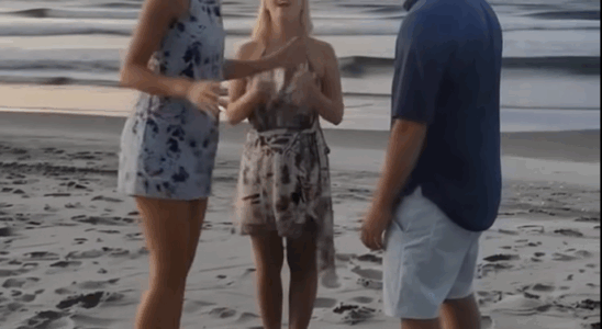 While on the Beach with My Husband, a Woman Ran Up, Knelt, and Said His Name