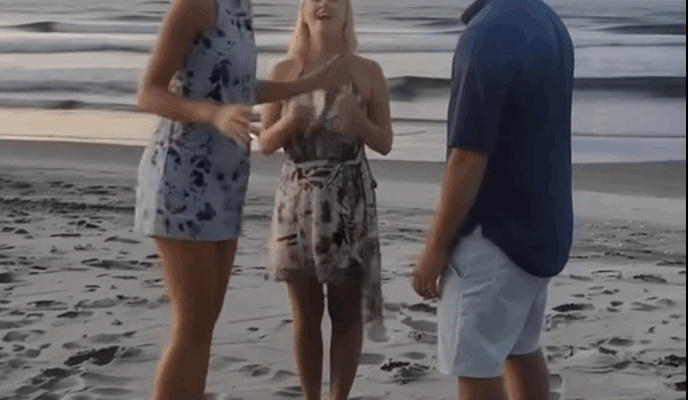 While on the Beach with My Husband, a Woman Ran Up, Knelt, and Said His Name