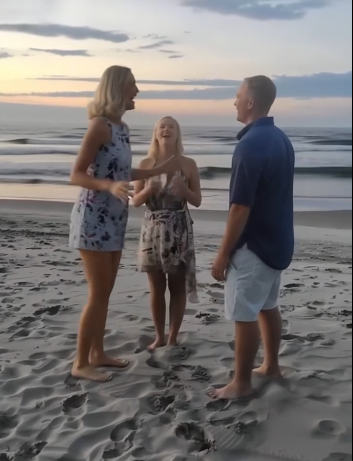 While on the Beach with My Husband, a Woman Ran Up, Knelt, and Said His Name